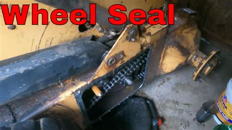 new holland l783 axle seal repair